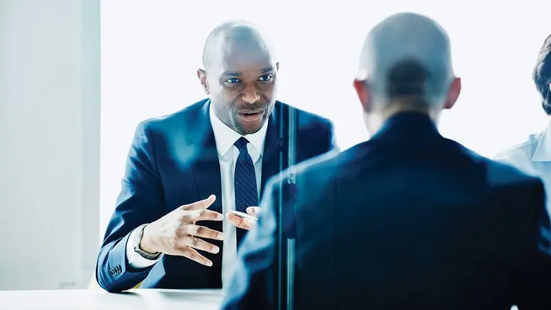 Financial advisor discussing European ETF exchange traded funds with a client